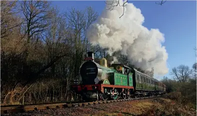  ??  ?? The Bluebell is renowned for its high standards of loco and carriage presentati­on, which consumes quantities of metal polish. H Class 263 passes Lindfield Wood on December 22, 2016. (Dave Bowles)