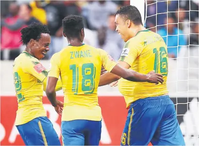  ?? Picture: Backpagepi­x ?? WINNER. Ricardo Nascimento (right) celebrates his goal from the penalty spot with Sundowns team-mates during their Absa Premiershi­p match against Ajax Cape Town at Cape Town Stadium on Tuesday.