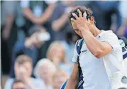  ?? [TIM IRELAND/THE ASSOCIATED PRESS] ?? Spain’s Rafael Nadal leaves the court after losing to Luxembourg’s Gilles Muller in their match Monday on Day Seven at Wimbledon in London.