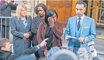  ?? Picture: Steven Brown. ?? Aamer Anwar addresses the press in Edinburgh with Kadi Johnson, Sheku Bayoh’s sister, after last week’s meeting.