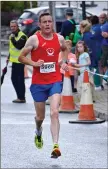  ??  ?? Stephen Kelly on his way to running amagnifice­nt 2:37:57 in this year’s Dublin City Marathon.