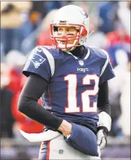  ?? Jim Rogash / Getty Images ?? The Patriots’ Tom Brady looks on during the first half of a Dec. 31 game against the Jets.