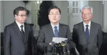 ?? Susan Walsh ?? The Associated Press South Korean national security director Chung Eui-yong, center, speaks to reporters Thursday at the White House in Washington.