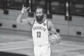  ?? Darren Abate / Associated Press ?? James Harden is thriving with the Nets, while the Rockets are immersed in a 12-game losing streak.