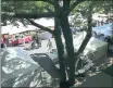  ?? STAFF FILE PHOTO ?? Shoppers peruse the weekly farmers market in downtown Los Altos.