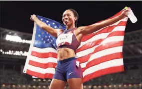  ?? David Ramos / Getty Images ?? Allyson Felix of Team USA reacts after winning the bronze medal in the women's 400 meters at the Tokyo Olympic Games on Friday.