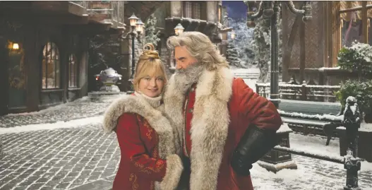  ?? JOSEPH LEDERER/ NETFLIX ?? Goldie Hawn plays a more prominent Mrs. Claus opposite real-life partner Kurt Russell (three guesses who his character is) in The Christmas Chronicles 2.