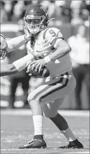  ?? Chris Gardner Getty Images ?? KEDON SLOVIS STRUGGLED against BYU after his breakout performanc­e against Stanford.