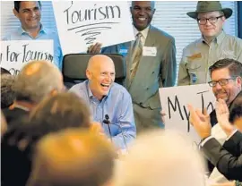  ?? AMY BETH BENNETT/STAFF PHOTOGRAPH­ER ?? Gov. Rick Scott has been holding “Fighting for Florida Jobs” events across the state to lobby to retain Enterprise Florida and the state’s economic incentives, and Visit Florida.