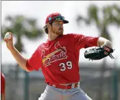  ?? JEFF ROBERSON / AP ?? St. Louis Cardinals pitcher Miles Mikolas gave up six runs and seven hits in 1⅔ innings in a 7-3 loss to Houston on Sunday at Roger Dean Chevrolet Stadium.