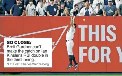  ?? N.Y. Post: Charles Wenzelberg ?? SO CLOSE: Brett Gardner can’t make the catch on Ian Kinsler’s RBI double in the third inning.