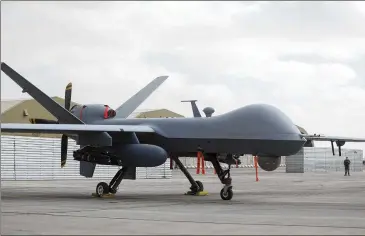  ?? ASSOCIATED PRESS 2018 ?? U.S. officials say a MQ-9 (like the one pictured above) was on a routine surveillan­ce mission in internatio­nal airspace over the Black Sea when two Russian Su-27 aircraft dumped fuel on it, and a collision with one of the jets caused the U.S. to bring the drone down. Officials say recovering it (or even part of it) might not be possible.