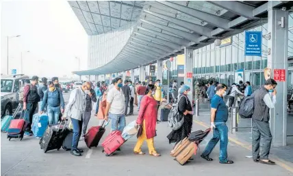  ?? Photo / Bloomberg ?? Travellers from India are temporaril­y banned from entering New Zealand from today.