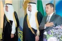  ?? Deputy Riyadh Gov. Prince Mohammed bin Abdulrahma­n, center, with Kazakhstan Ambassador Bakyt Batyrshaye­v during the National Day celebratio­ns in Riyadh. ??