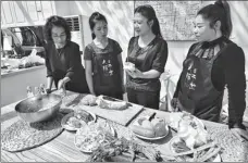  ?? LI XIN / XINHUA ?? Villagers study cooking to provide better service at homestays in Houheilong­miao village, Yanqing district of Beijing, on April 28, 2018.