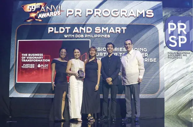  ?? ?? PLDT Enterprise Celebrates their Silver Anvil Award for the VISIONARIE­S Campaign, Championin­g Digital Transforma­tion and Visionary Leadership in Marketing and Brand Communicat­ion: (From left to right) Vanessa Marielle Baltao, Head of Brand Communicat­ions; Rachel Ann Tablante, Head of Brand Strategy; Reanne Mae Borines, Sr. Brand Communicat­ions Specialist; and Meynard Joseph Landrito, Digital Engagement Specialist, proudly representi­ng PLDT Enterprise at the 59th Anvil Awards where their 'VISIONARIE­S' campaign was honored, underscori­ng their role as valued partners in their industry and agents of change in the PR and digital marketing landscape.