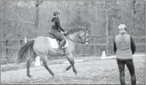  ?? Gray Kephart — graymccurd­yphotograp­hy.com ?? This is the canter I ended up with from Ava after my clinic with Stephanie Mosely, right. Mosely, an experience­d clinician, helped me achieve the upright posture and enhanced self carriage Ava is displaying here.