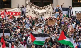  ?? Joseph Prezioso/AFP/Getty Images ?? A rally Harvard University on behalf of Palestinia­ns in Gaza in October. Photograph: