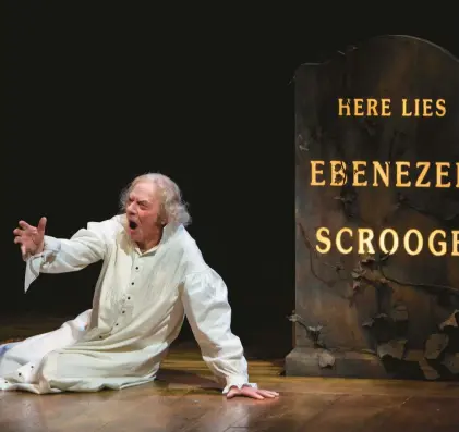  ?? JENNIFER KOSKINEN/DENVER POST ?? Philip Pleasants portrays Ebenezer Scrooge in the Denver Center Theatre Company’s production of “A Christmas Carol.”