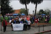  ?? HUNTER CRESSWELL — THE TIMES-STANDARD FILE ?? Out of the Darkness walks in Arcata bring people together to promote mental health. But how are people coping in the age of shelter-in-place, which demands they stay apart from each other?