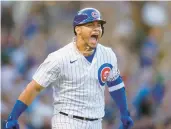  ?? ARMANDO L. SANCHEZ/CHICAGO TRIBUNE ?? Cubs catcher Willson Contreras yells after hitting a grand slam during the first inning against the Pirates at Wrigley Field on May 16.