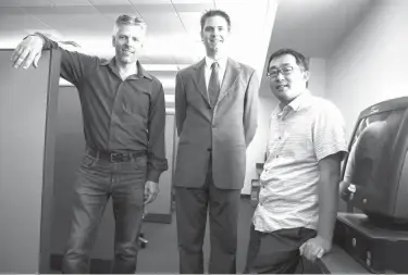  ?? The Dallas Morning News photos via AP ?? n From left, assistant professor of communicat­ions Mark Tremayne, associate professor of computer science and engineerin­g Christoph Csallner and associate professor of computer science and engineerin­g Chengkai Li are shown Friday at the University of...