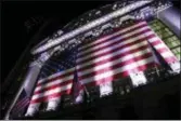  ?? PETER MORGAN — THE ASSOCIATED PRESS FILE ?? An American flag hangs on the front of the New York Stock Exchange in New York. U.S. stocks skidded late Thursday following a report that the Trump administra­tion could put tariffs on $200 billion in Chinese goods as early as next week.