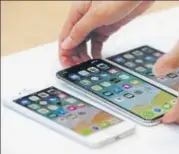  ?? AFP ?? The new iPhone 8, iPhone X and iPhone 8S on display during the Apple special event at the Steve Jobs Theatre on the Apple Park campus, in Cupertino, California on Tuesday