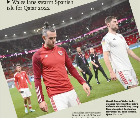  ?? Photo: VCG ?? Gareth Bale of Wales looks dejected following their side’s defeat in the World Cup Group B match against England on November 29, 2022 in Doha, Qatar.