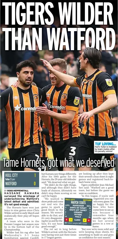  ?? ?? TUF LOVING... Hull’s Tufan is mobbed by team-mates after his penalty winner