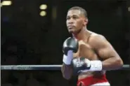  ?? GREGORY PAYAN — THE ASSOCIATED PRESS FILE ?? In this file photo, boxer Daniel Jacobs squares off against Sergio Mora during their WBA middleweig­ht title fight at the Barclays Center in New York. Jacobs likes to think of himself as New York’s resident boxer. He’ll be spreading his word on Saturday...