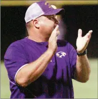  ?? MARK BUFFALO/RIVER VALLEY & OZARK EDITION ?? Mayflower head football coach Todd Langrell applauds a play during his team’s win over Rose Bud during the 2017 season. Langrell, who was recently hired as the Vilonia Eagles head coach, is the 2017 River
Valley & Ozark Edition Coach of the Year.