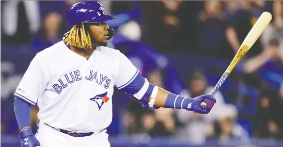  ?? FRaNK GUNN/THE CANADIAN PRESS ?? The Blue Jays’ Vladimir Guerrero Jr. steps to the plate for the first time during the second inning of Friday night’s game in Toronto against the Oakland A’s.