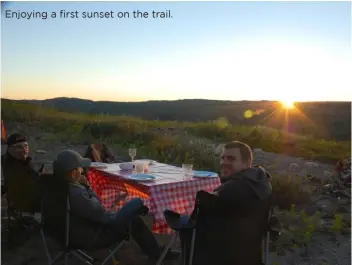  ??  ?? Enjoying a first sunset on the trail.