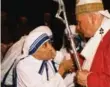  ??  ?? Mother Teresa with Pope John Paul II in 1997. The “saint of the gutter” will be canonized on Sept. 4.