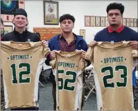  ?? Courtesy Photo ?? Dawson Mcpeak, left, Enrique Correa, center and Dean Rice, right, all pose with the jerseys they will wear on Saturday in the 61st Annual Optimist All-star Game at Sacramento State.