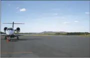  ?? Diane Wagner / Rome News-Tribune ?? A Cessna Citation business jet sits at Floyd County’s Richard B. Russell Regional Airport, in front of the main runway that is slated to be extended to 7,000 feet from 6,000 feet to accommodat­e larger planes.