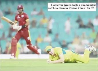  ?? ?? Cameron Green took a one-handed catch to dismiss Roston Chase for 25