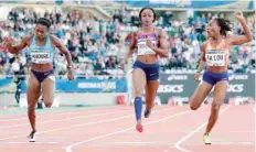  ?? — AFP ?? Jamaica’s Elaine Thompson (2ndR) wins the women’s 100m of Paris’ Diamond League athletics meeting in Paris.