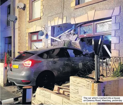  ??  ?? The car which crashed into a house on Ewenny Road, Maesteg, yesterday