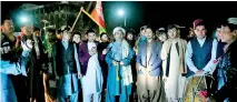  ??  ?? Youths and peace activists gather as they celebrate the reduction in violence, in Kandahar. (Photo by JAVED TANVEER / AFP)