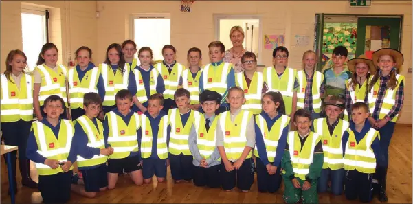  ??  ?? Fourth class pupils from Craanford NS who gave a farm safety demonstrat­ion with their teacher Marie Kinsella.