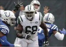  ?? SETH WENIG - THE ASSOCIATED PRESS ?? FILE - In this Oct. 14, 2018, file photo, New York Jets offensive tackle Kelvin Beachum (68) looks to put a block on Indianapol­is Colts linebacker Anthony Walker (50) during the first half of an NFL football game, in East Rutherford, N.J. Beachum is a big man with big blocks and an even bigger heart.