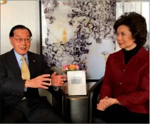  ?? ZHOU PAI / CHINA DAILY ?? Elaine Chao, US transporta­tion secretary-designate, and her father, Dr James S.C. Chao, sit down with China Daily for an exclusive interview in Washington on Thursday.