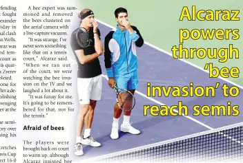  ?? PHOTO BY MATTHEW STOCKMAN/AFP ?? BEE BREAK
Alexander Zverev of Germany and Carlos Alcaraz of Spain watch as bees are removed from the stadium during the BNP Paribas Open at Indian Wells Tennis Garden on Thursday, March 14, 2024, in Indian Wells, California.