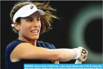  ?? — AFP ?? BRISBANE: Johanna Konta of Britain hits a return against Madison Keys of the US during their first round women’s singles match at the Brisbane Internatio­nal tennis tournament at the Pat Rafter Arena in Brisbane.