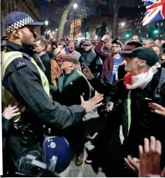  ??  ?? Tempers flare: A pro-Brexit protest in London last year