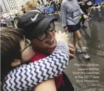  ??  ?? Martin’s children supported her from the sidelines at the 2017 New York Marathon.