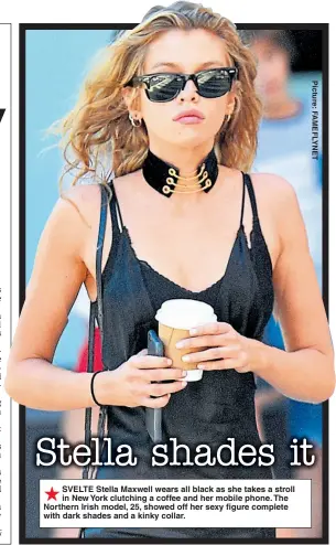  ??  ?? SVELTE Stella Maxwell wears all black as she takes a stroll in New York clutching a coffee and her mobile phone. The Northern Irish model, 25, showed off her sexy figure complete with dark shades and a kinky collar.