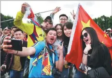  ?? WU FANG / FOR CHINA DAILY ?? Some 100,000 Chinese tourists are visiting Russia during the 2018 FIFA World Cup and it is estimated that their spending will top 3 billion yuan ($452.7 million).